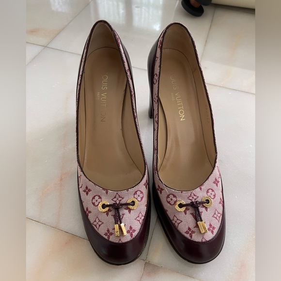 Like new- LV stacked heels. The perfect shoe for the holiday season!